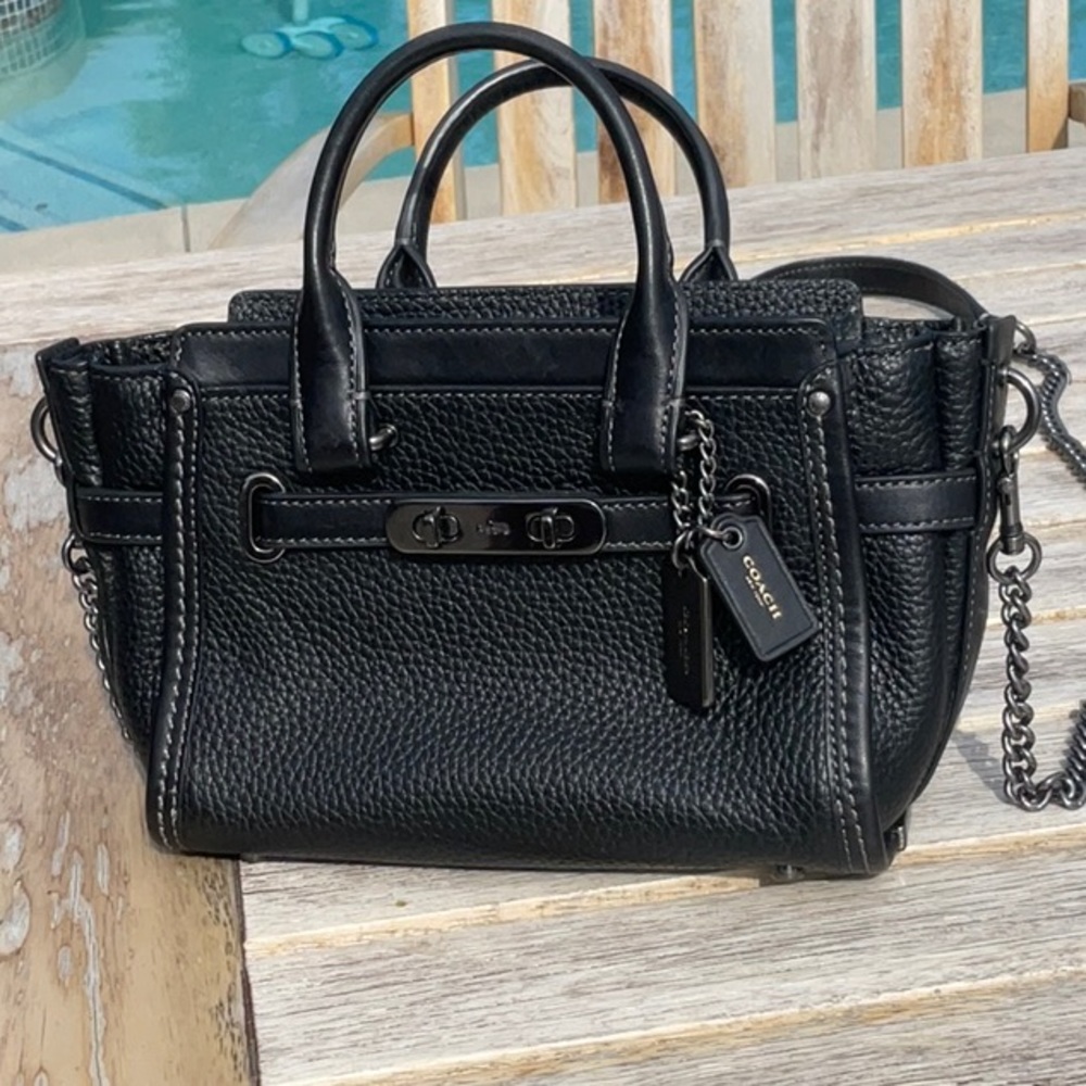 Coach small bag with handles or a shoulder strap